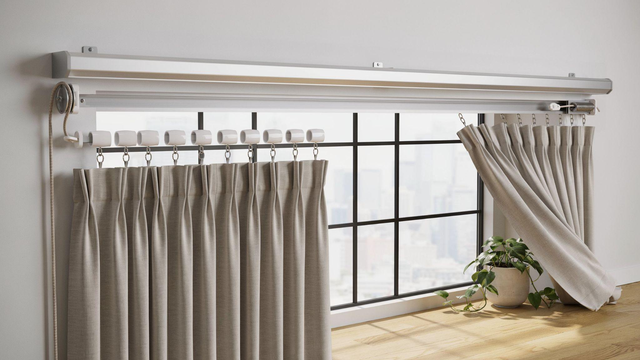 Traverse curtain rod system showing cord, carriers, gliders, and smooth curtain movement
