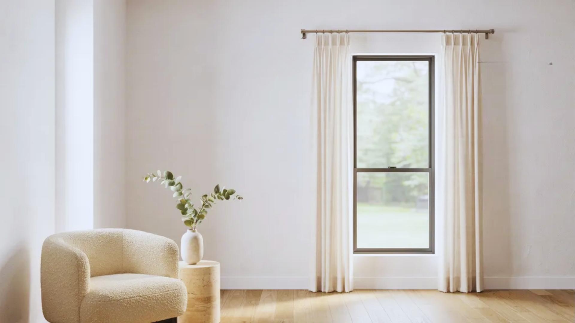 modern window showing properly placed curtain rod brackets with correct height and side spacing marked for balanced and clean installation.