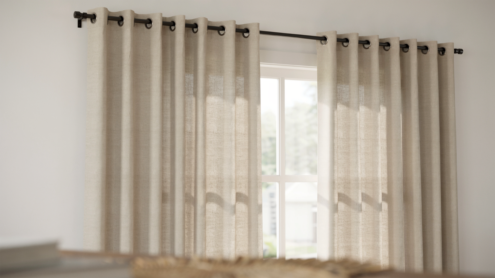 "Close-up of grommet curtains with metal eyelets on curtain rod showing even folds and natural light in modern interior window"