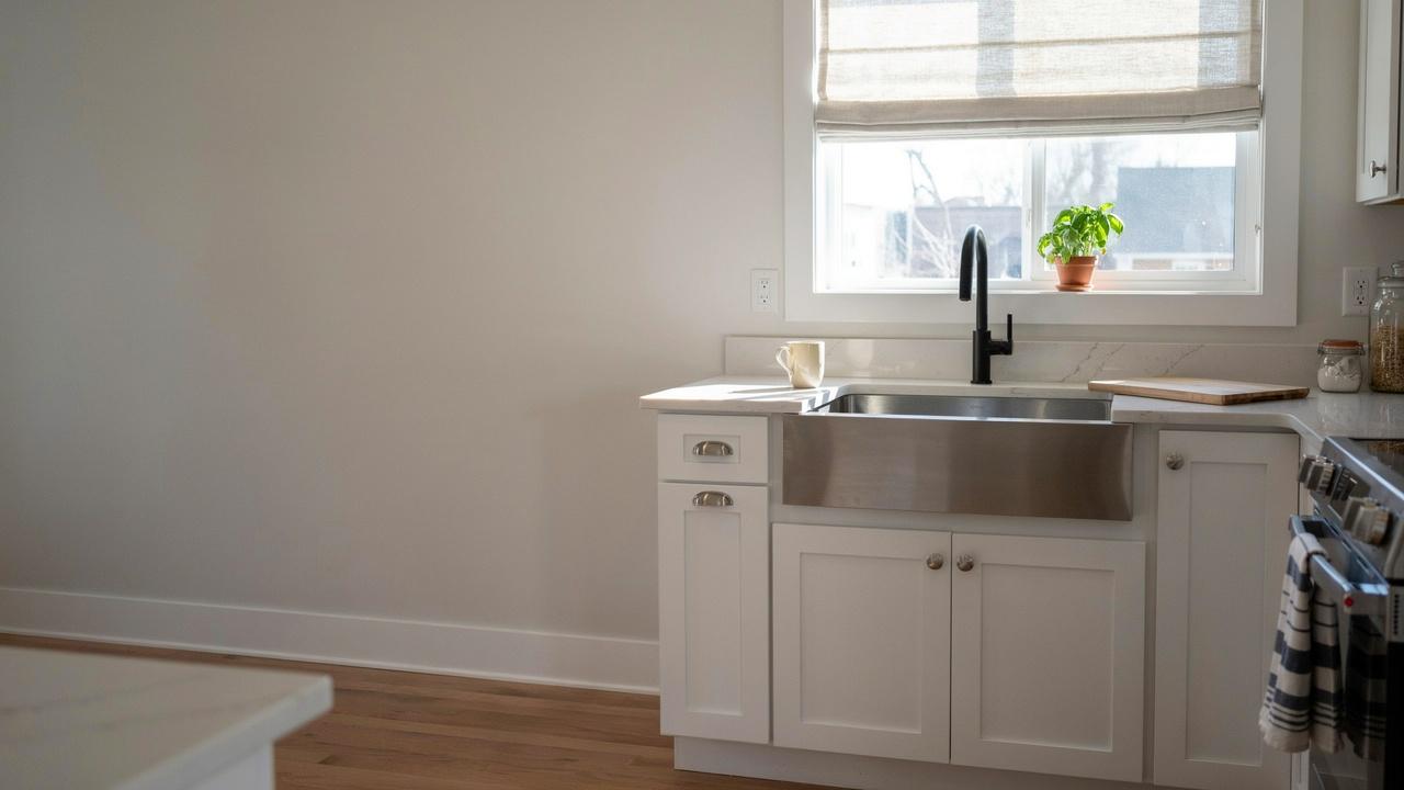Roman shades in a modern kitchen.