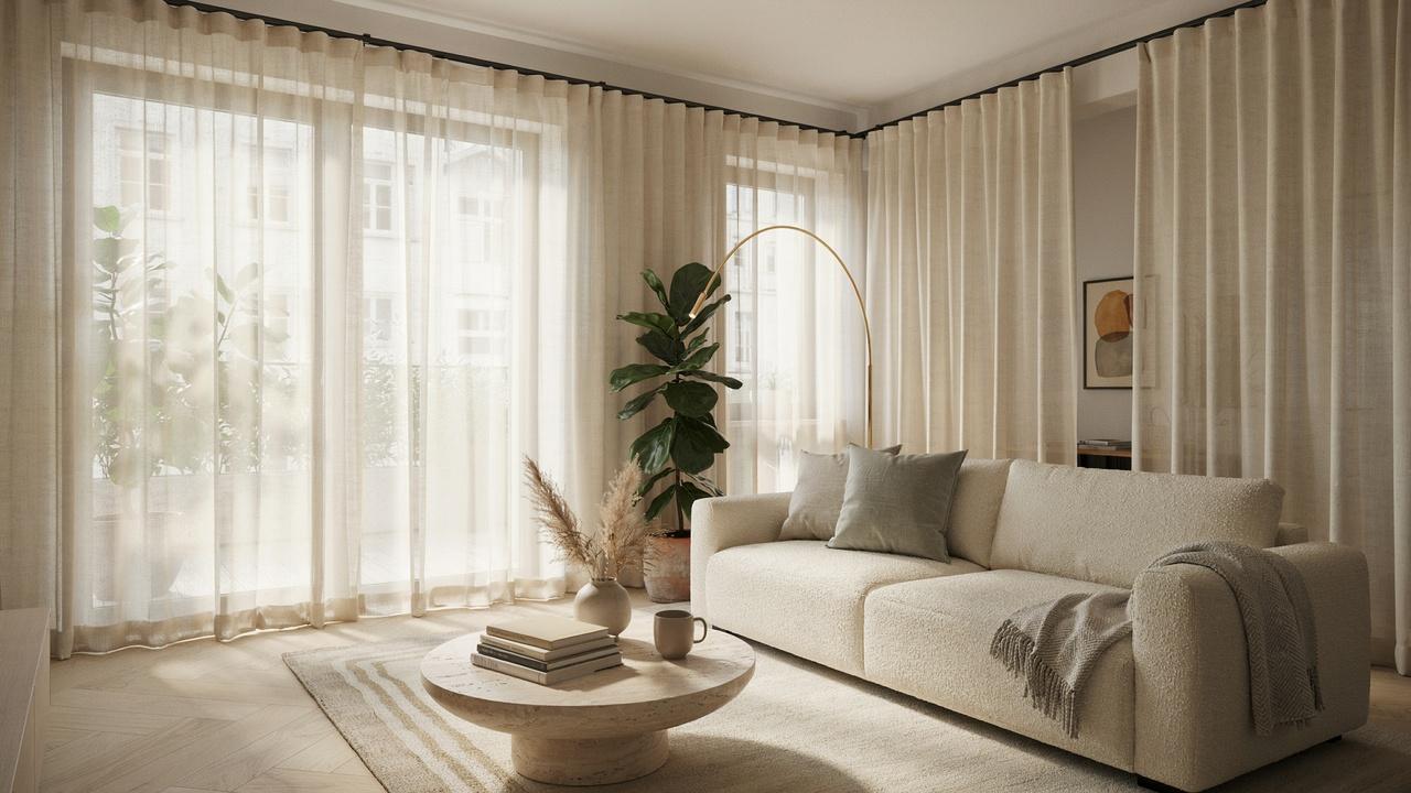 Modern living room with semi-sheer curtains softly diffusing sunlight while providing enhanced privacy.