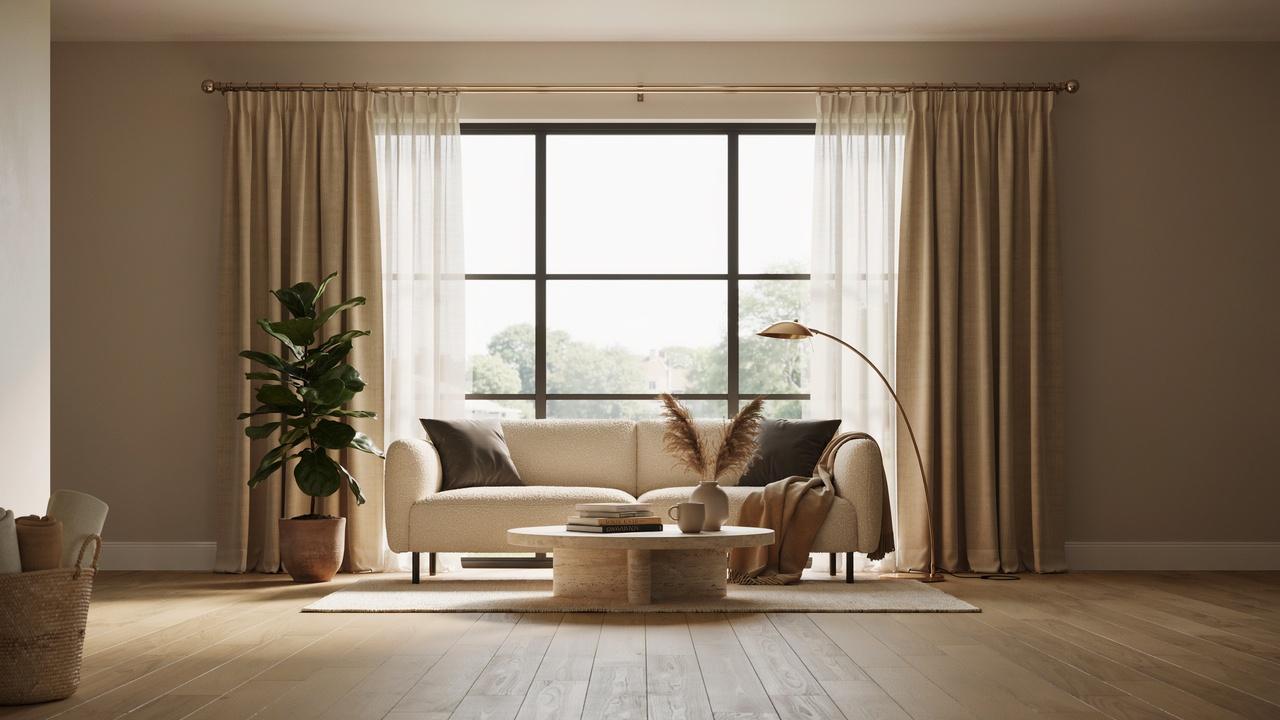 Large picture window framed by symmetrical floor-length curtains and a well-placed curtain rod for a balanced, elegant look.