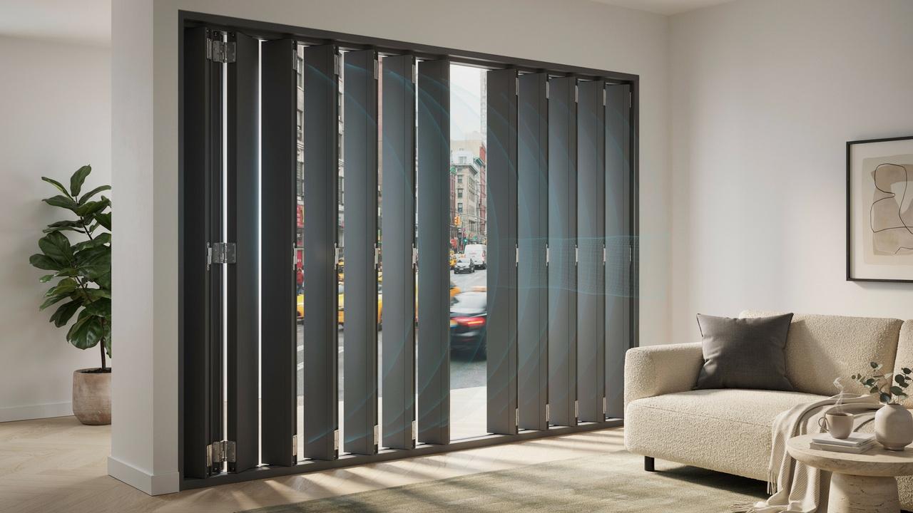 Modern soundproof shutters reduce traffic and outdoor noise from entering a peaceful home interior.