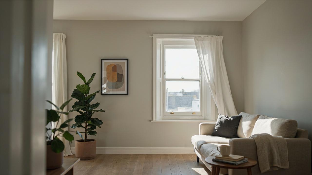 Modern home window with a partially open window sash holding the glass.