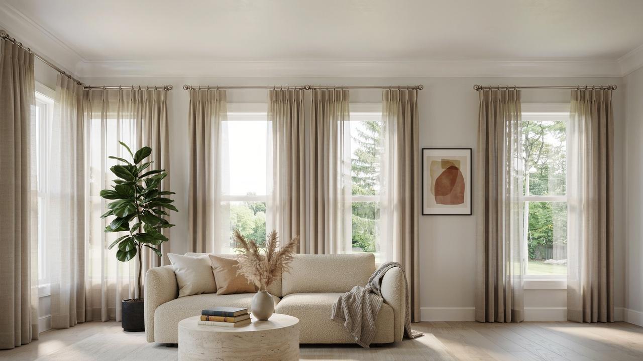 Windows with crown molding and tall ceilings showing different curtain rod placement techniques for various room layouts.