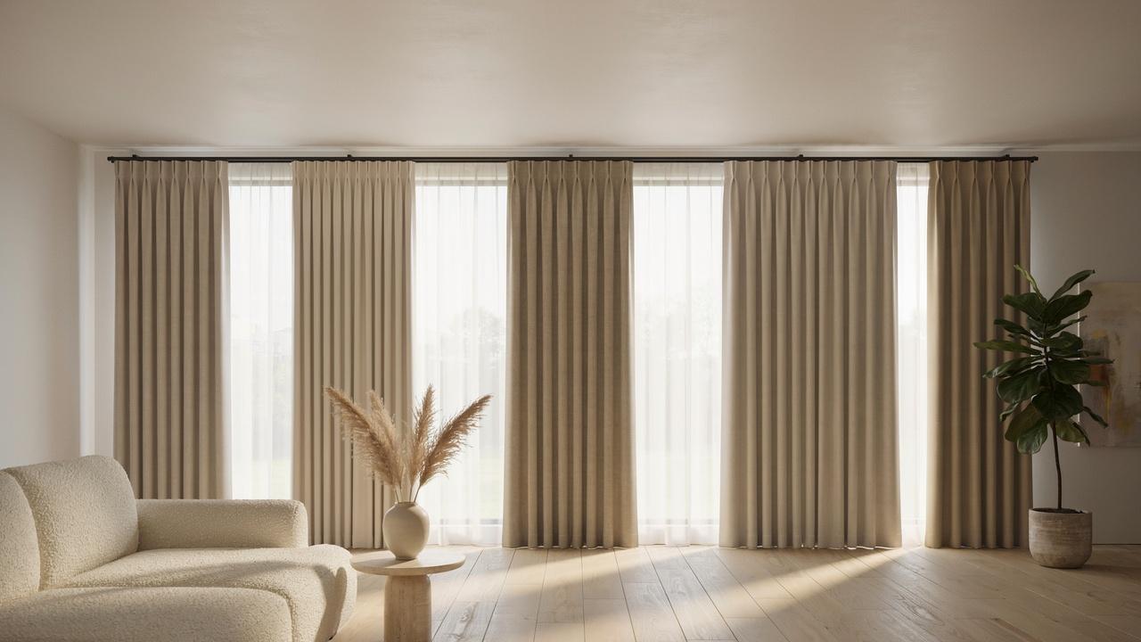 Classy living room display featuring multiple curtain pleat styles with different folds and draping patterns.