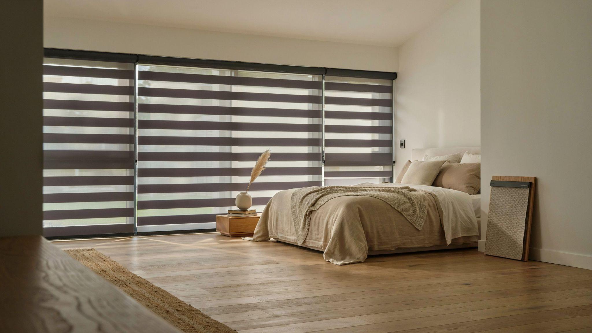 Modern zebra blinds showing light filtering, edge light gaps, and motorized option in contemporary bedroom.