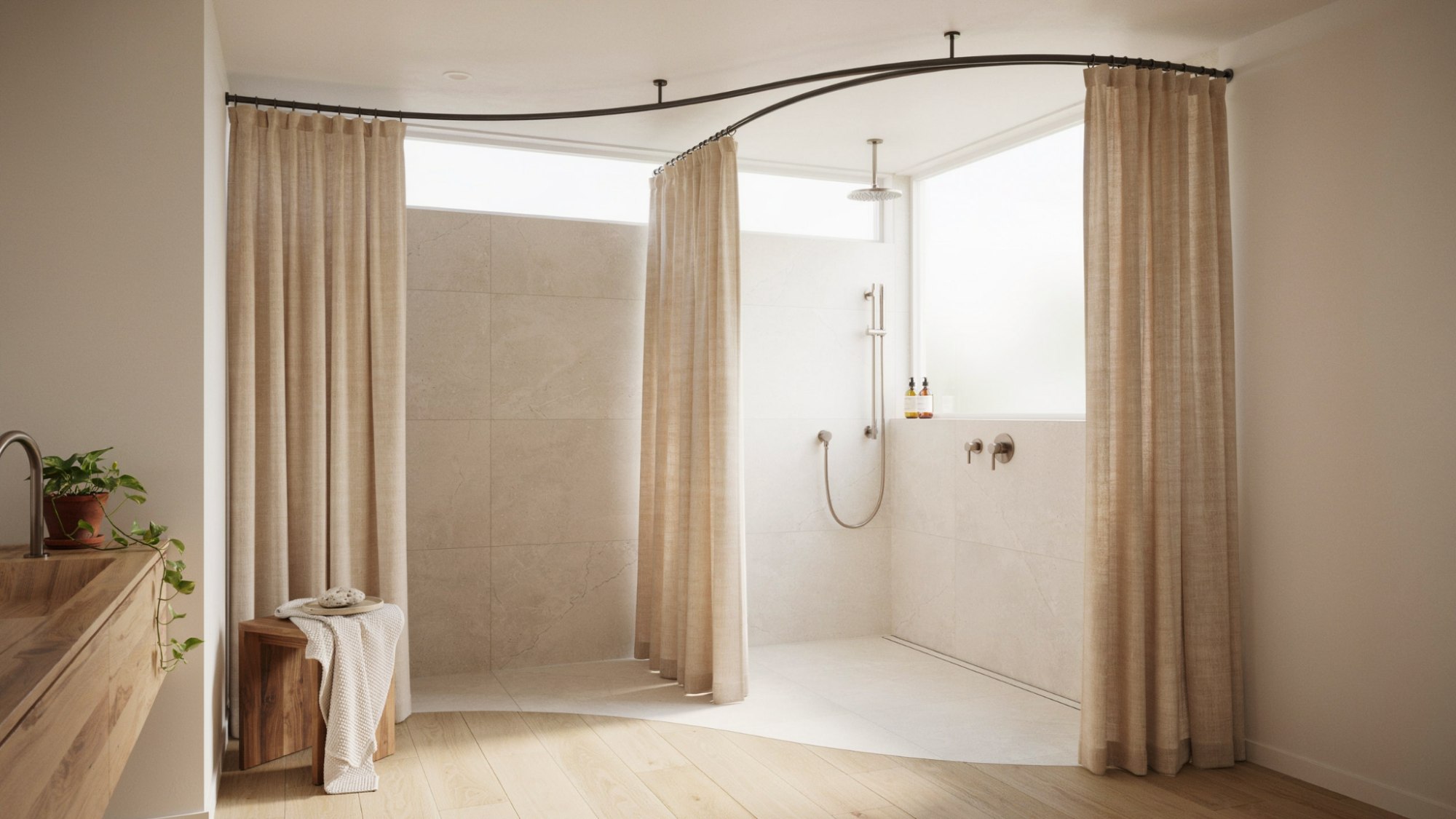 Modern walk-in shower with a stylish curtain instead of a glass door, featuring elegant tilework, contemporary fixtures, and a bright spa-influenced bathroom design.