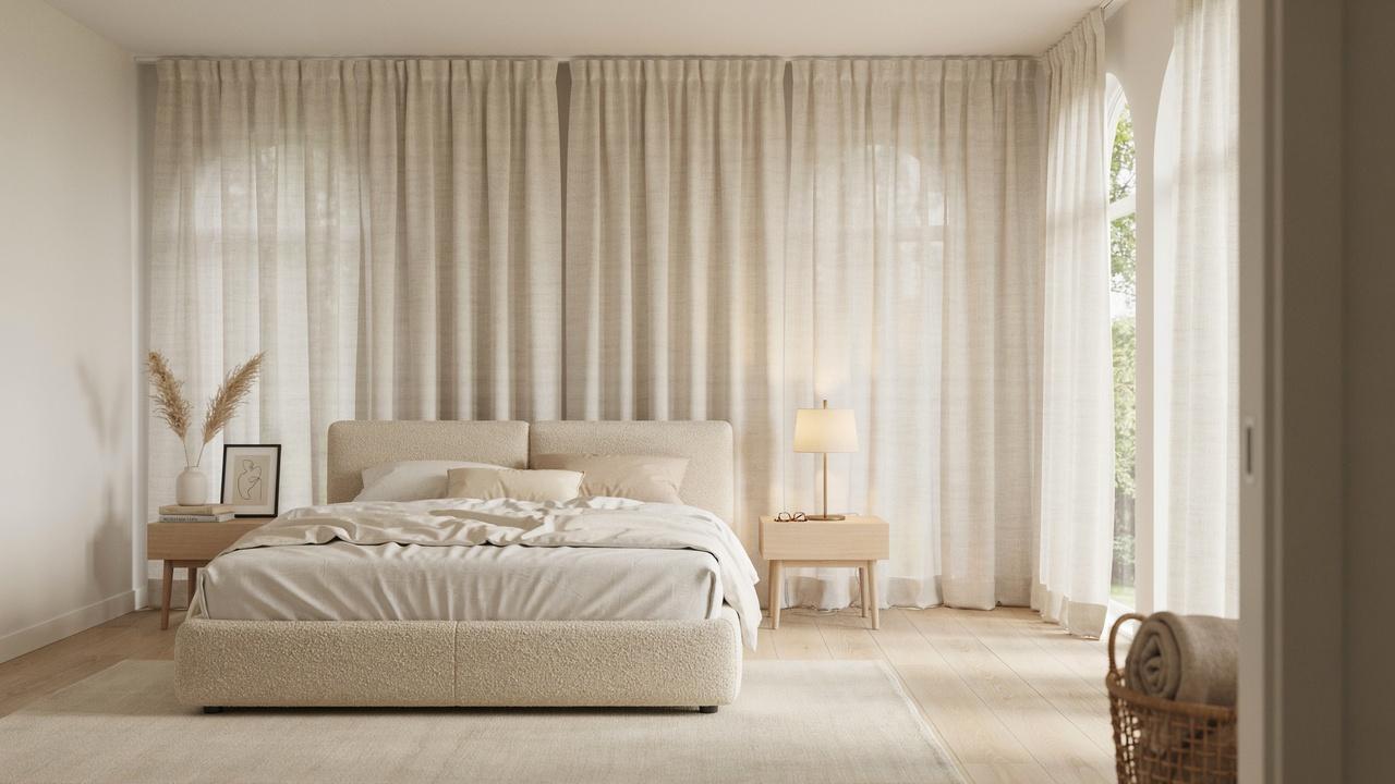 Bright airy bedroom with bouclé bed, beige bedding, sheer curtains, oak nightstands, pampas decor.