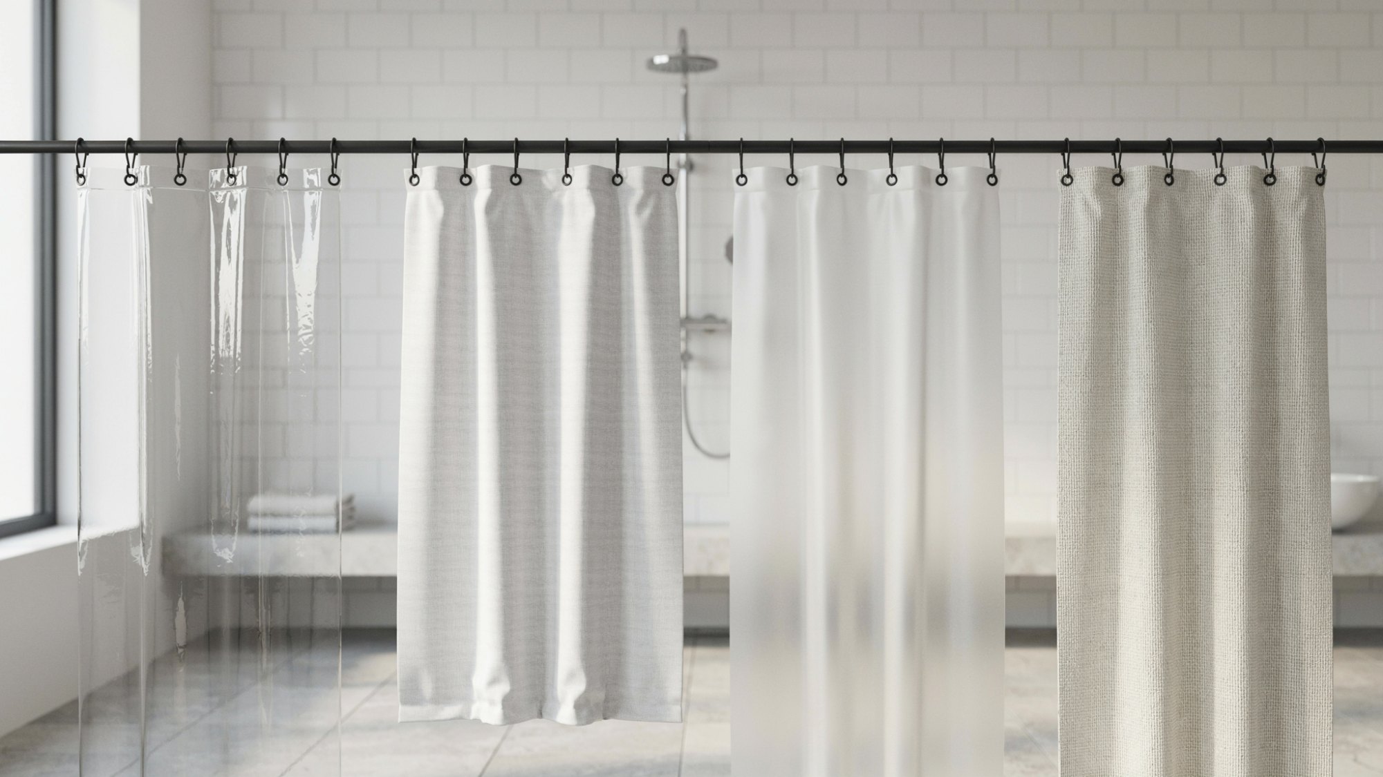 Four shower curtains clear, linen, frosted, and waffle weave hanging on black rod in bright modern bathroom.